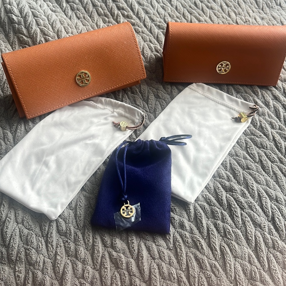 Tory Burch sunglass cases and jewelry pouch